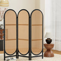 Black 3-panel arched rattan room divider in living room lifestyle with wooden round sideboard and rattan pendant lamp