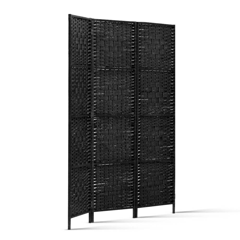 Black 3-panel woven paper rope room divider folded compact storage side view on white background with gold hinges visible