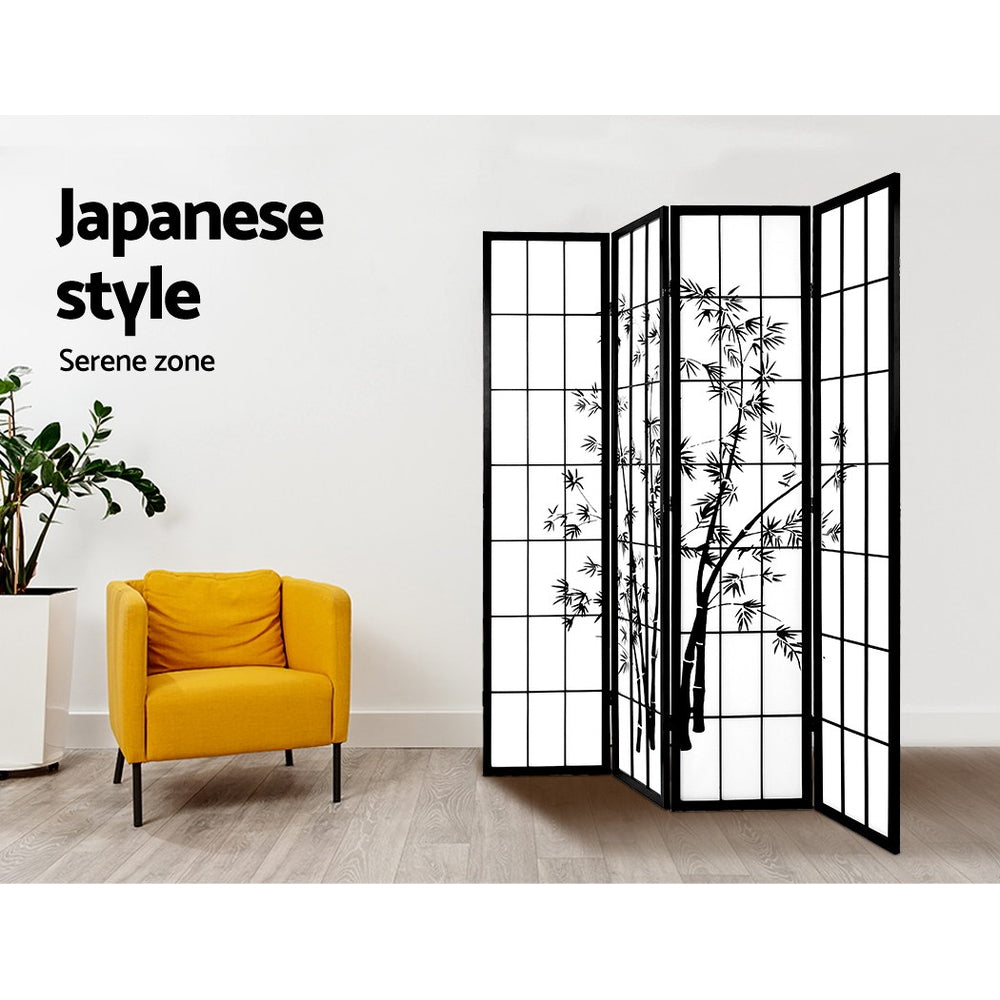 Black 4-panel bamboo print shoji room divider in living room lifestyle with yellow armchair and ZZ plant against white wall