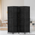 Black 4-panel woven paper rope room divider in dining room lifestyle with Eames chair dining table and grey sideboard
