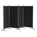 Black 4-panel fabric room divider with X-base pole stands zigzag angle view on white background showing four panels