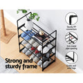 Black 4-tier metal open shoe rack strong frame infographic with PP connectors and 7cm pipe spacing callouts