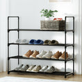 Black 4-tier metal shoe rack with PP connectors in hallway, rattan basket and plant on top, shoes on shelves