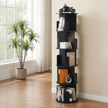 Black 5-tier spiral rotating bookshelf with round shelves in living room, holding books, decor and ornaments