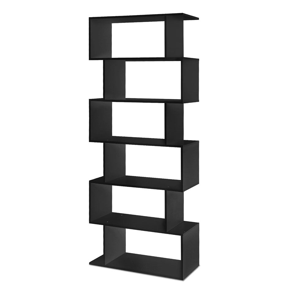 Black 6-tier S-shaped display bookcase loaded with books, vases and baskets in living room with cream sofa