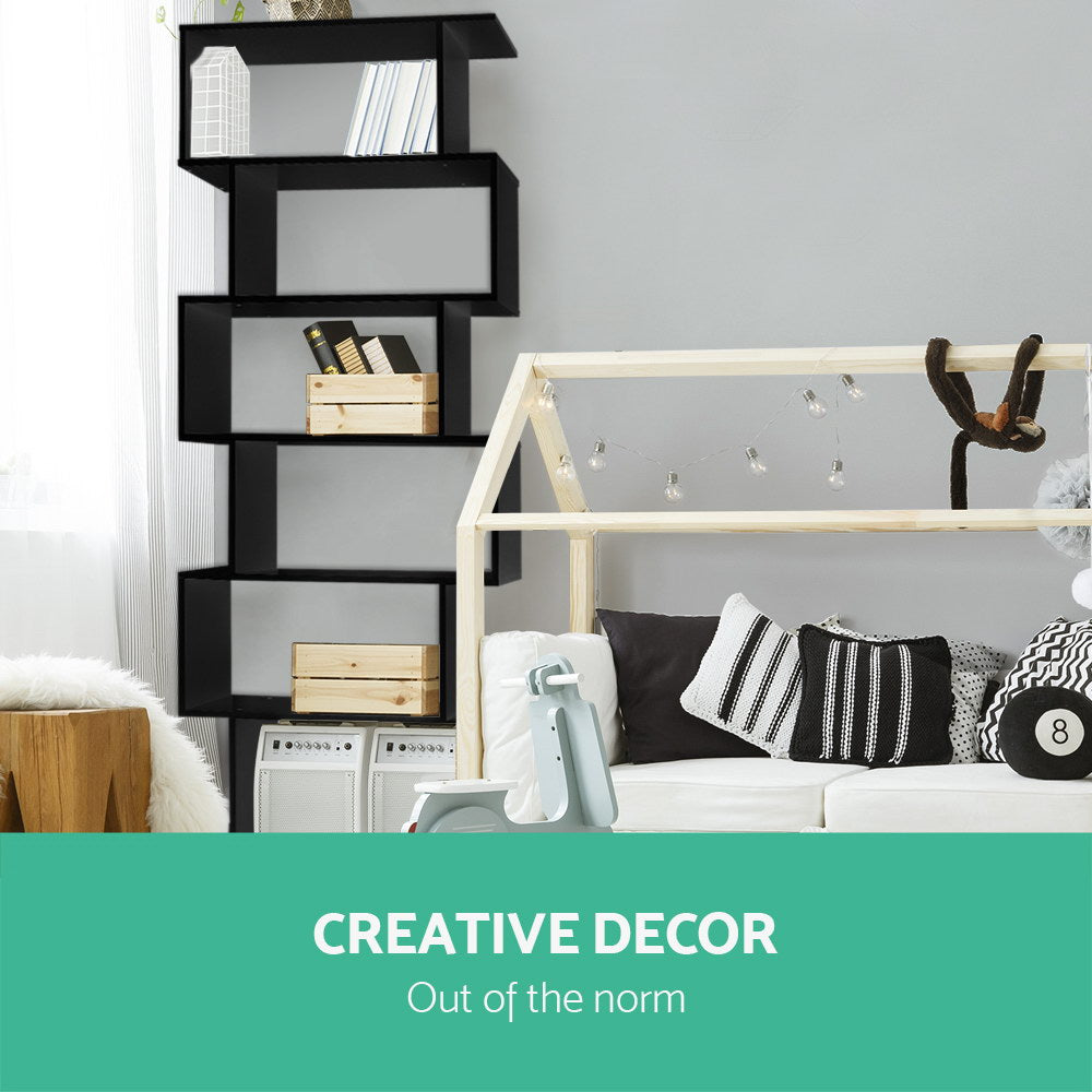 Black S-shaped bookcase in children's bedroom beside house-frame bed, text reads Creative Decor