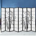 Black 8-panel bamboo print shoji room divider against blue wall background showing all eight panels and bamboo design