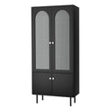 Tall black display cabinet angled view on white background, two arched fluted glass upper doors and two solid lower doors