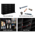Black CD media unit 4-panel features: wide base, wall fixings, flexible shelf heights, deep storage 14.5x14.8x31.5cm