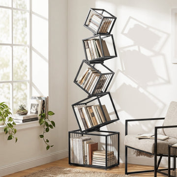 Black metal diagonal cube bookshelf with 5 angled shelves in zigzag formation, books displayed in living room