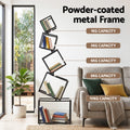 Black diagonal cube bookshelf in living room showing powder-coated metal frame, shelves labeled 1kg to 10kg capacity