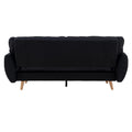 Rear view of black fabric sofa bed showing back panel and bed conversion mechanism on white background