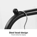 Close-up of black steel ball bead on garment rack crossbar with metal hanger and steel bead design prevent slipping text