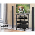 Black HiFi AV rack lifestyle with TV dog on screen Xbox receiver and two floor speakers in room