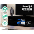 Black glossy LED TV unit beautiful ambience in brick room with eco-friendly natural anti-corrosion badges and tempered glass
