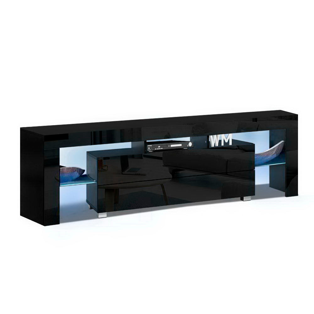 Black glossy LED TV unit angle view on white blue LED strip two side towers center drawers open shelf on chrome feet