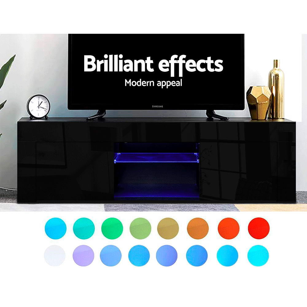 Black glossy LED TV unit brilliant effects 16 colour swatches Samsung TV on top with gold vase and clock