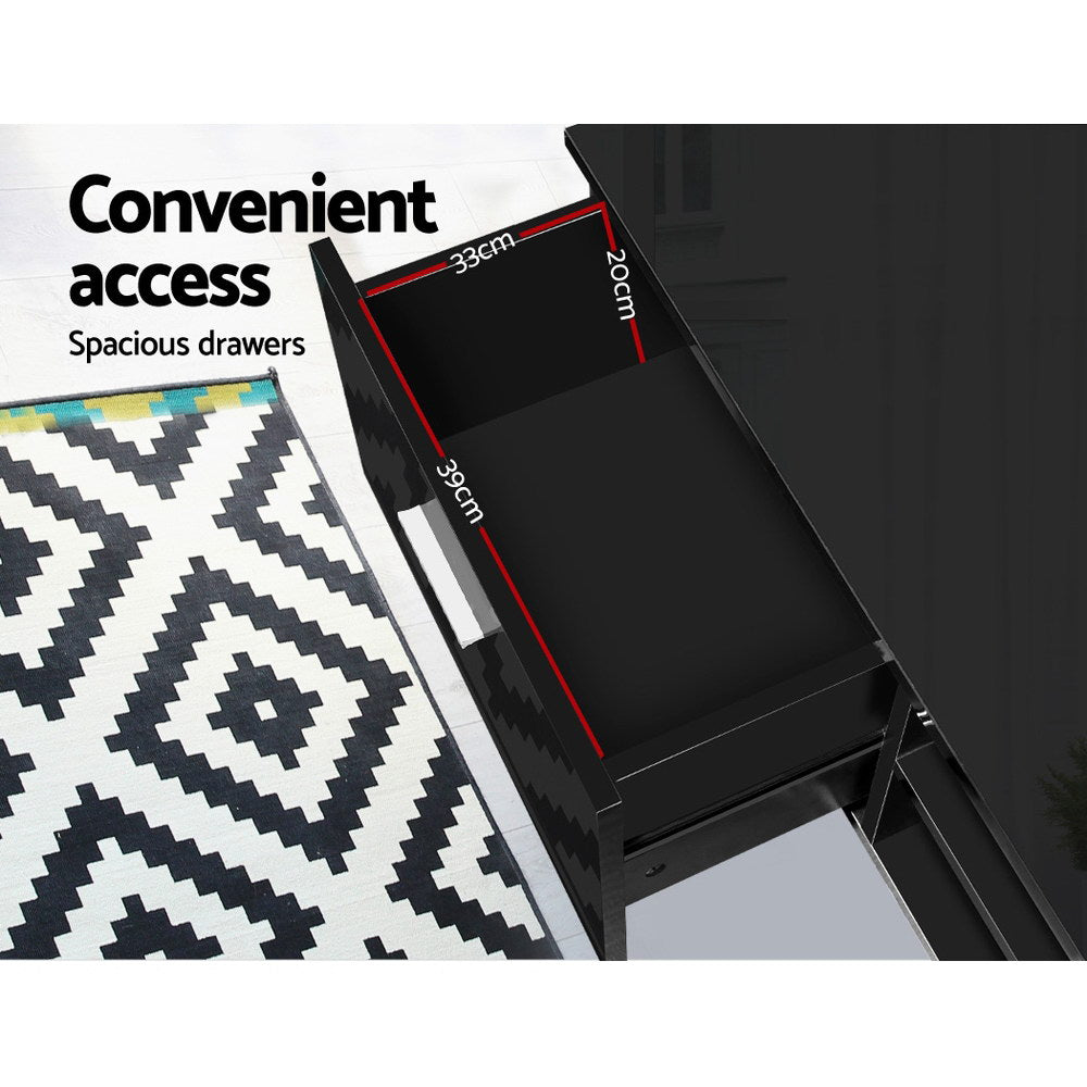 Black glossy TV unit convenient access drawer open 33x20x39cm with smooth metal runners on geometric rug