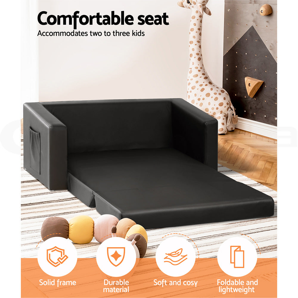 Comfortable seat infographic showing black kids sofa bed extended in kids room with giraffe toy and feature icons