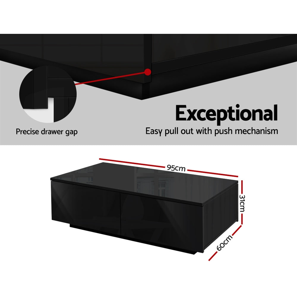 Top-down view of black L-shaped coffee table showing surface and lower shelf
