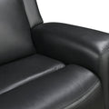 Black leather recliner close-up showing control button and panel detail