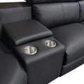 Close-up of black leather recliner sectional sofa centre console with two stainless steel cup holders