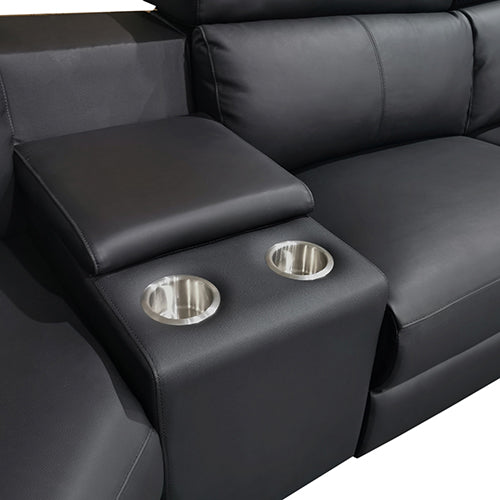 Close-up of black leather recliner sectional sofa centre console with two stainless steel cup holders