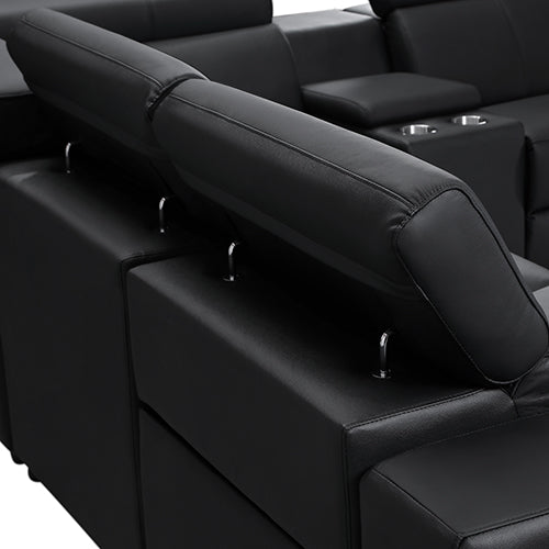 Close-up detail of black leather recliner sofa adjustable headrest with chrome pull pins visible