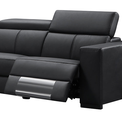 Black leather recliner sofa end seat close-up with footrest extended and headrest raised at angle