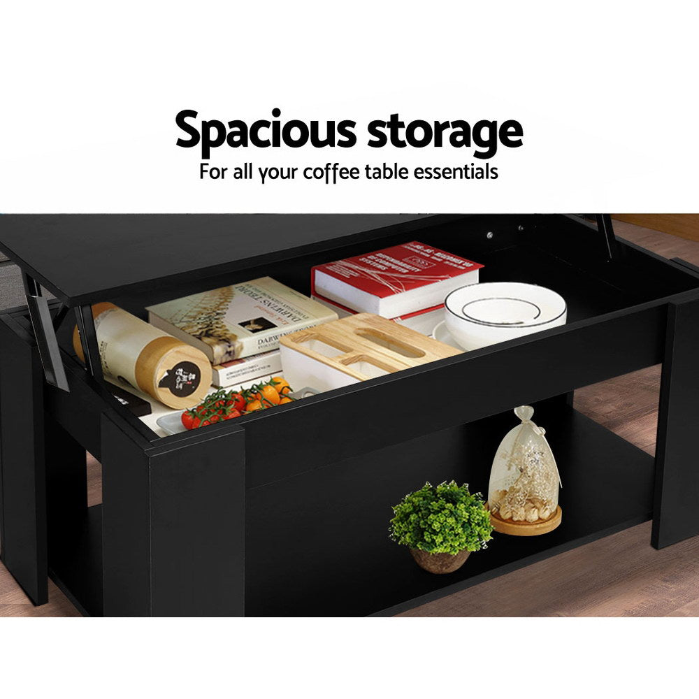 Side profile of black lift-top coffee table with lower open shelf and tapered legs