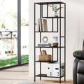 Black metal-frame 5-tier open display shelf styled in living room with books, plant vase, basket, and storage boxes