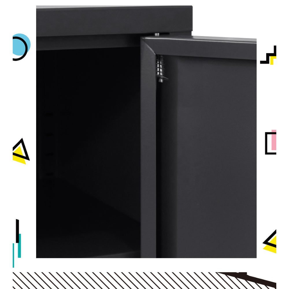 Close-up of black metal sideboard cabinet door corner with open door showing coiled spring hinge