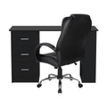 Black office desk with three drawers and black executive chair rear view on white background