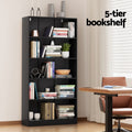 Black five-tier bookcase styled with books and decor in home office beside a desk; text reads 5-tier bookshelf