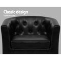 Close-up of black PU leather tub chair barrel back with button tufting, text: Classic design, Tufted backrest