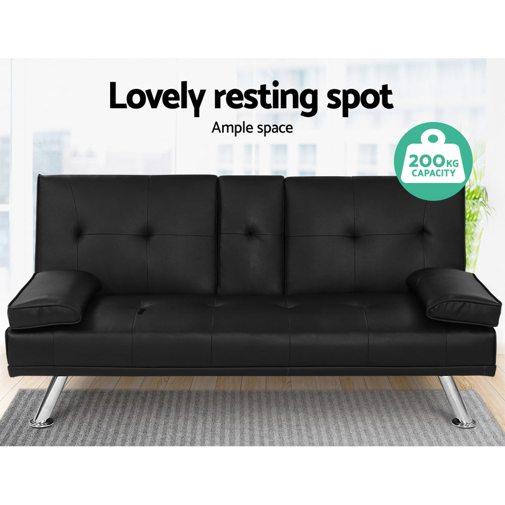 Black PU leather sofa bed in room showing 200kg capacity badge, chrome legs and bolster armrests