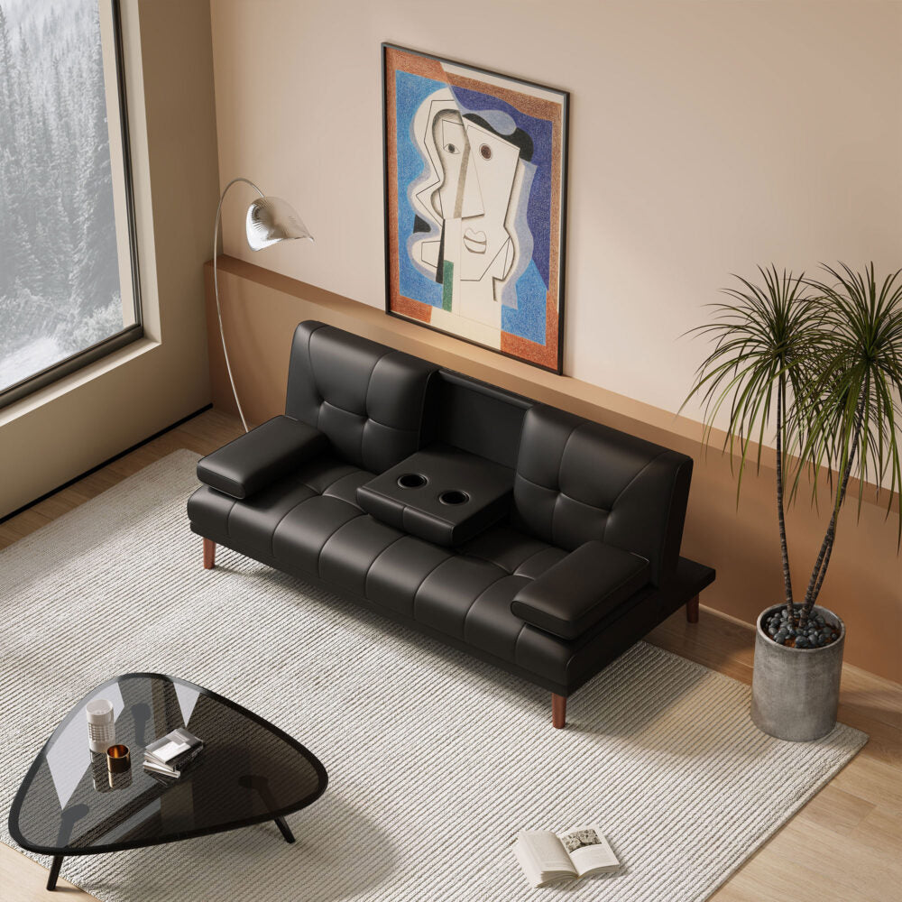 Black PU leather sofa bed with cup holders open in modern living room with abstract artwork