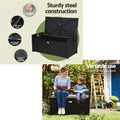 Black rattan bench: feature callouts incl. steel ropes, anti-rust hinges; woman and child seated reading; 300kg capacity