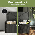 Black rattan bench open: indoor use with pillows and outdoor with garden tools; text: weather-resistant, integrated handle