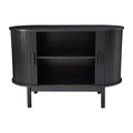 Black reeded sideboard front view on white background with both doors slid open showing interior shelf