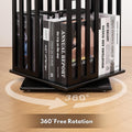 Close-up of black rotating tower bookshelf base showing 360-degree rotation mechanism with books on bottom shelf