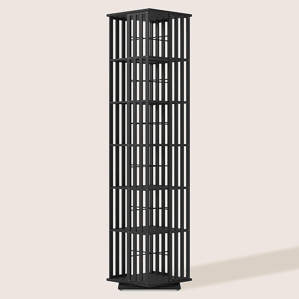 Black 6-tier rotating tower bookshelf with vertical slatted panels on all four sides, front view on beige background
