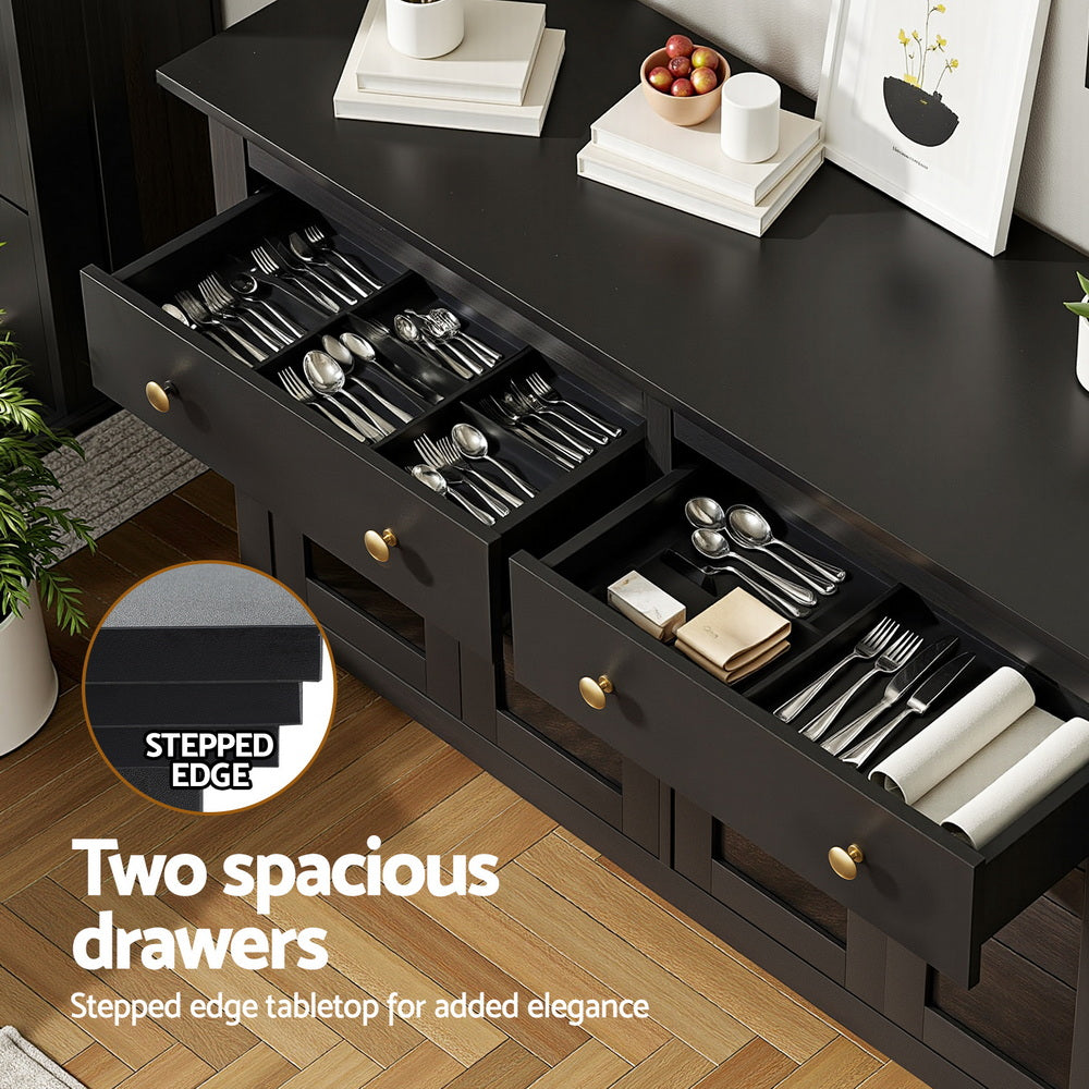 Black sideboard two open drawers filled with cutlery, text: Two spacious drawers, stepped edge tabletop, gold knob handles