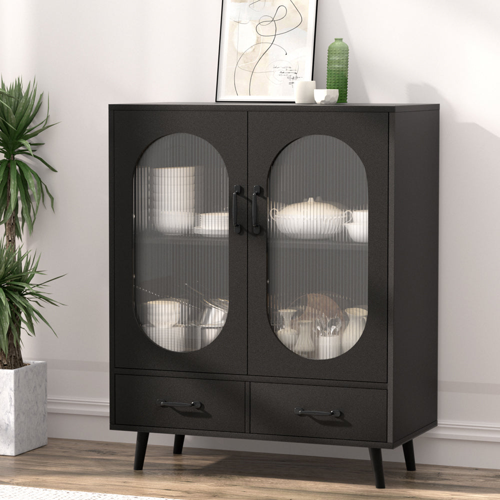Black sideboard with two oval ribbed glass doors and two bottom drawers in lifestyle room setting