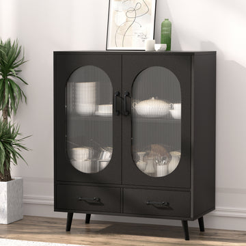 Black sideboard with two oval ribbed glass doors and two bottom drawers in lifestyle room setting