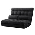 Black suede 2-seat floor lounger upright on white background, front-right angle, two bolster pillows