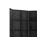 Black woven paper rope room divider top panel corner close-up showing woven rope texture and black wood frame detail