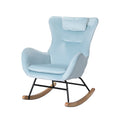 Light blue velvet wingback rocking chair three-quarter angle view with headrest pillow, black metal frame and wood runners