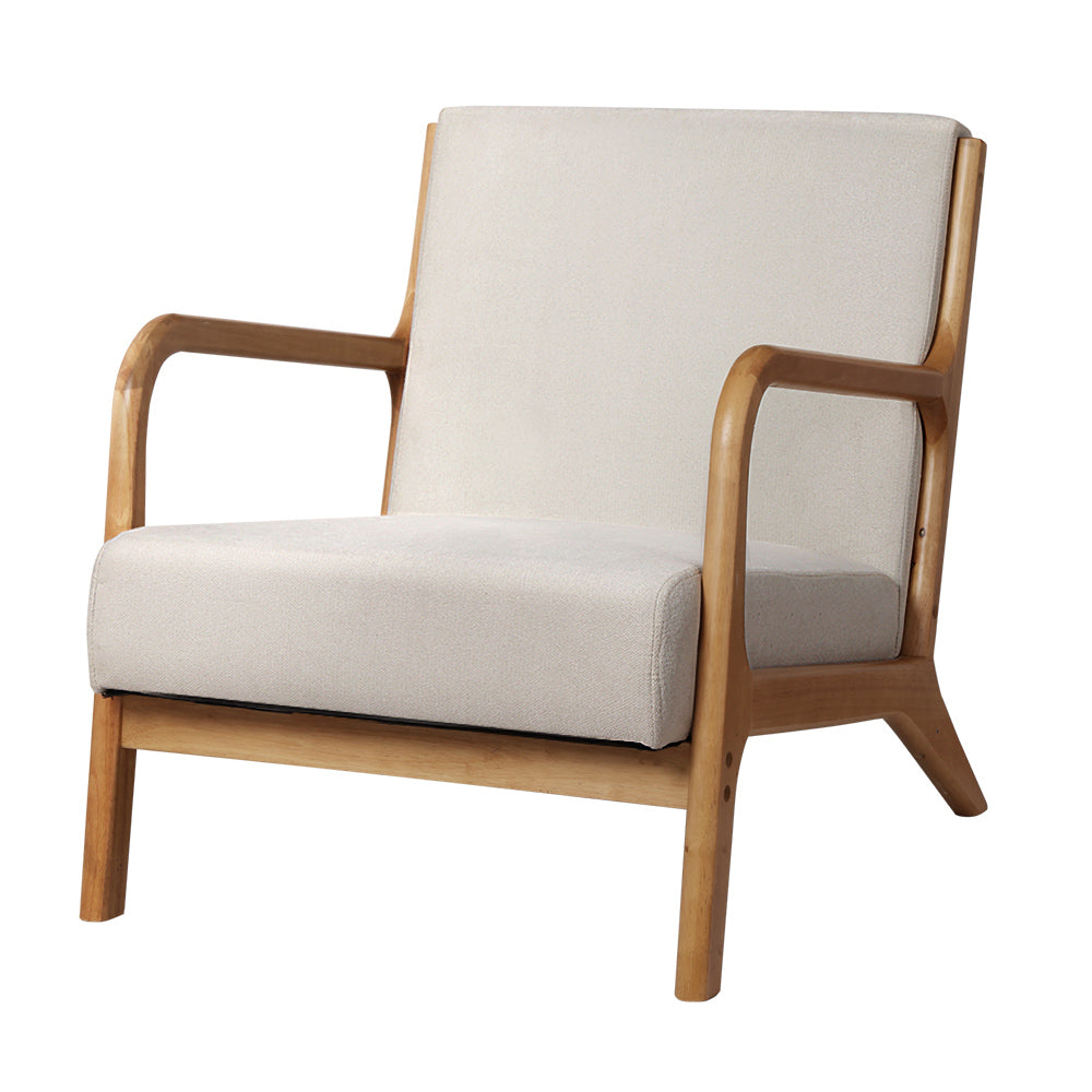 Cream boucle upholstered armchair with curved natural wood frame three-quarter angle view on white background