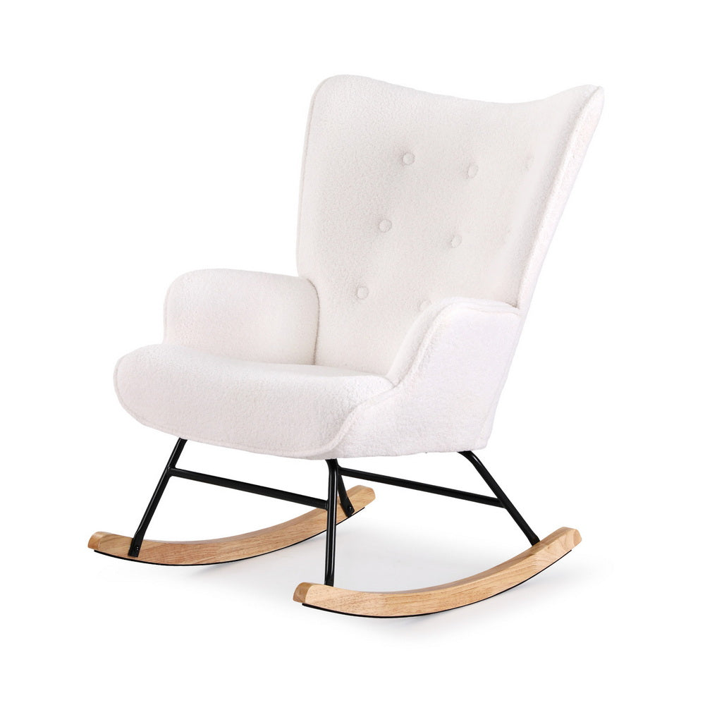White boucle wingback rocking chair with button-tufted back, black metal frame and wood rockers, angle view